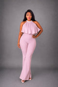 Combinaison femme chic en orange vif, cette pièce incontournable